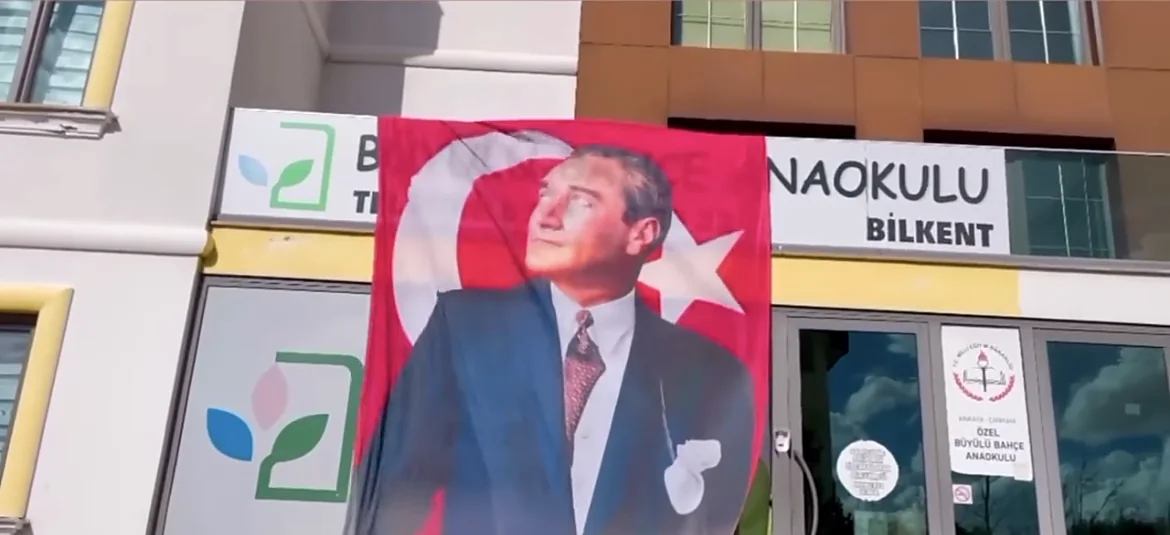 Republic Day, 29 October: Atatürk poster and Turkish flag at our school entrance