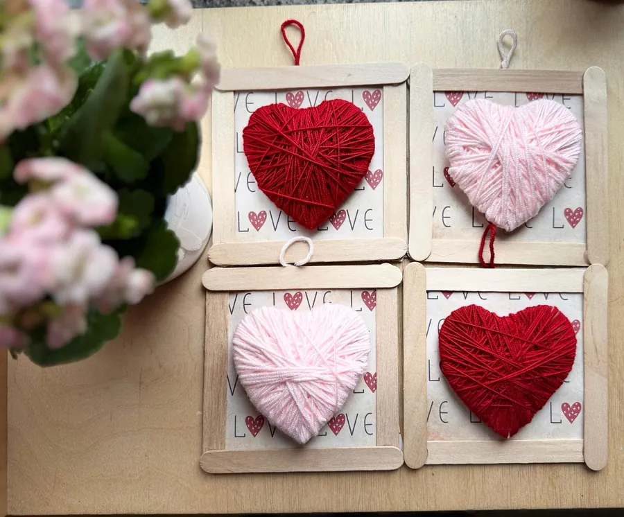 Yarn-wrapped hearts in lolly-stick frames